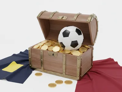Futbol topu ve jetonlarla hazine sandığı